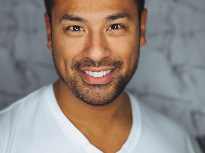 Thai wellness center with traditional massage room, peaceful decor, and healing atmosphere